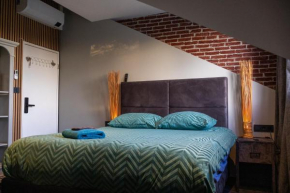 Koraal - Comfortabele kamer bij B&B Gezond aan Zee - Toegang Wellnesstuin meerprijs